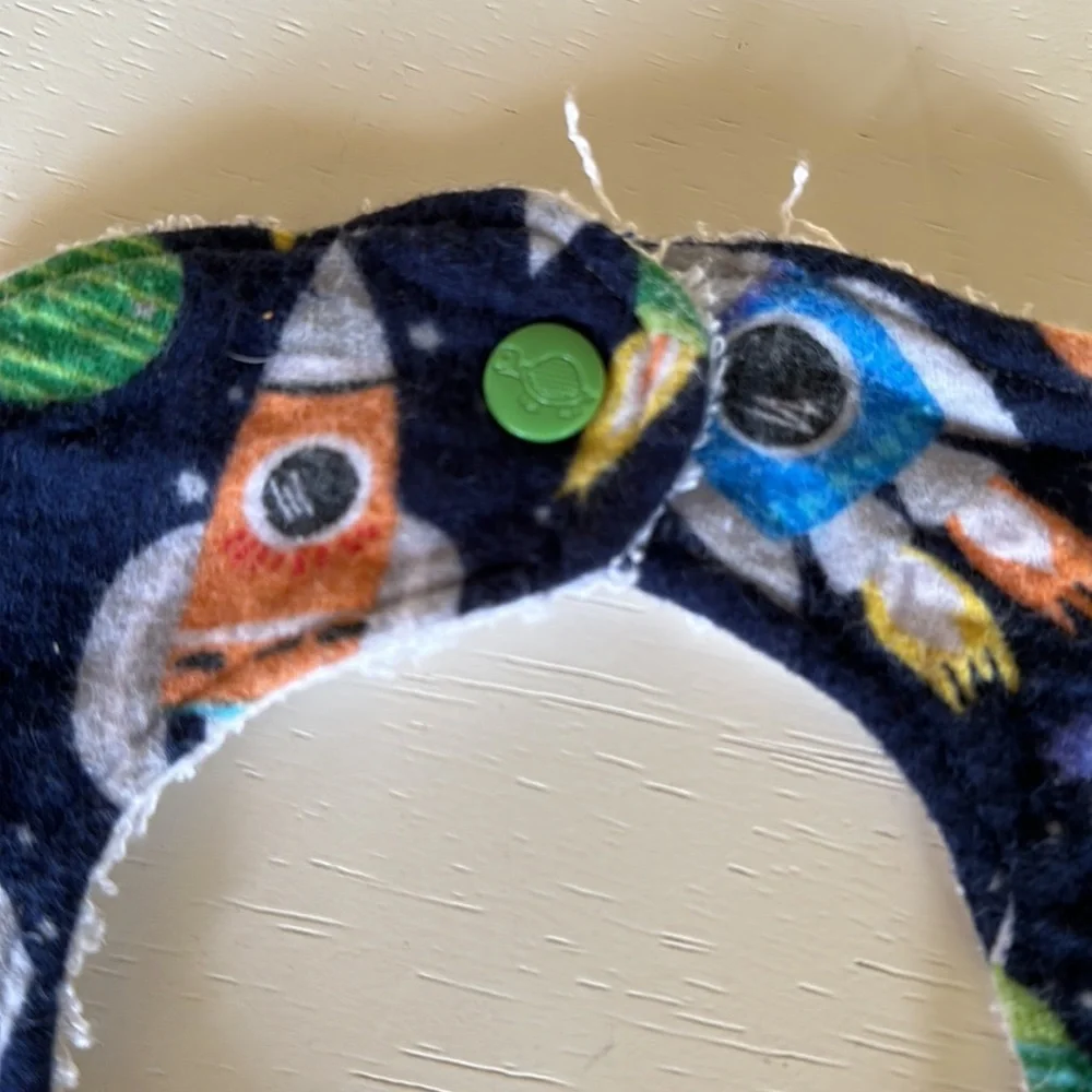 Handmade rocket ship bib